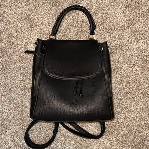 Faux leather black backpack purse with leopard print lining